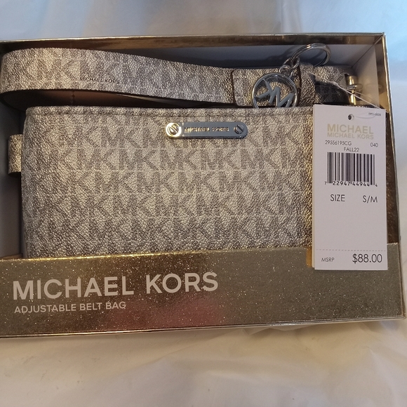 Michael Kors Handbags - NEW Michael Kors Silver Belt Bag.Can also remove belt to use as Wristlet